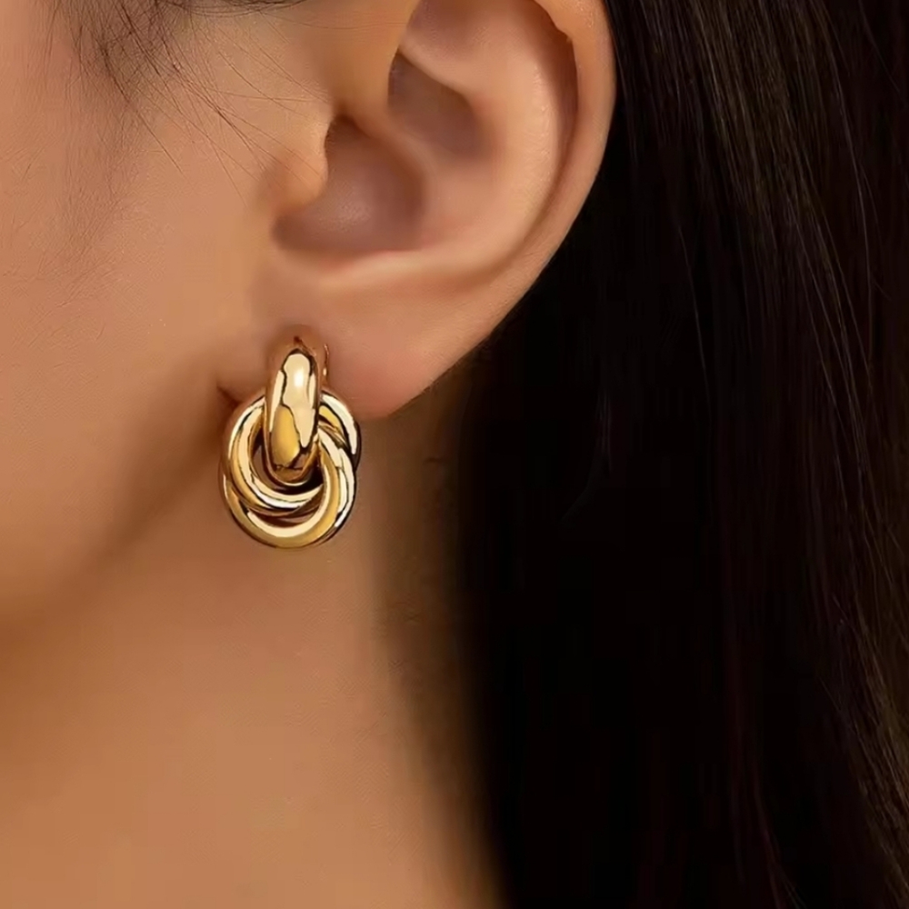 Elegant gold knot hoop earrings; .9" long x .63" wide